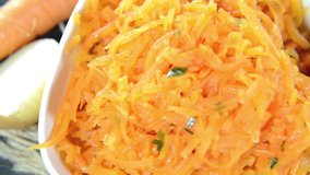 Fresh homemade carrot salad (detailed seamless loopable video)