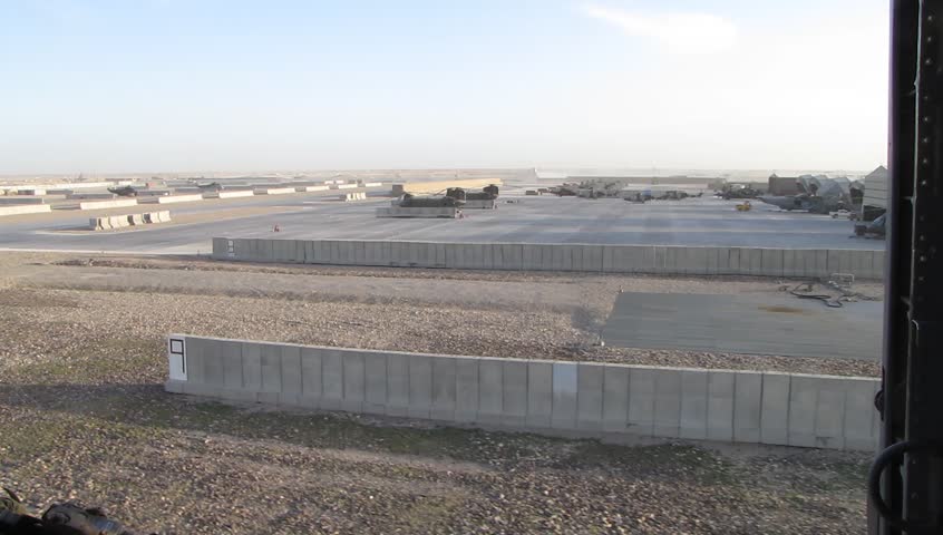 Point of View Shot of Airbase from Military Helicopter Take Off and Rotation 