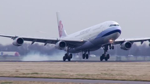 AMSTERDAM, THE NETHERLANDS - FEBRUARI 27, 2014: 4K China Airlines A340 landing