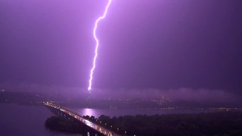 Thunderstorm with lightning in night city. Slow motion video footage 1080p full HD. High speed camera shot