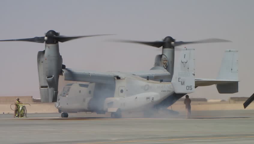 marine v-22 osprey helicopter idles on tarmac (HD)