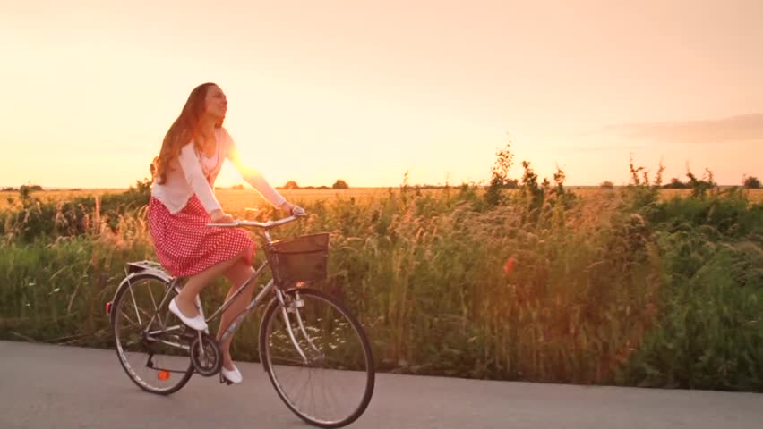 Happy Woman Riding Bike On Beach Stock Photo - Download 