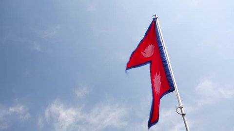 The national flag of Nepal is the world's only non-quadrilateral national flag. Until 1962, the flag's emblems, the sun and the crescent moon, had human faces.
