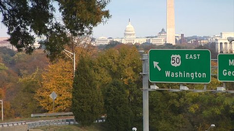 Virginia highway with view of iconic Washington DC landmarks. 
