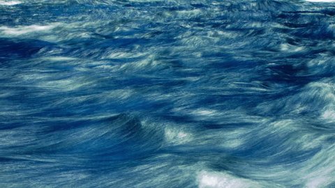 HD - Video Background 2213: Abstract blue ocean waves ripple and roll (Loop).