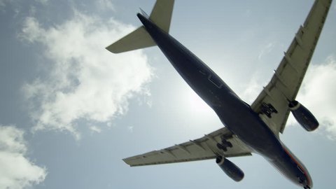 Airplane Flies Overhead - Plane Flying in Slow Motion with Audio 
