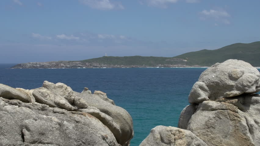 Zoom out from the sea to coast and blowholes in Albany, Western Australia