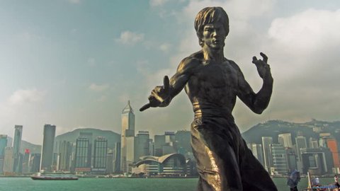 HONG KONG - SEPTEMBER 12, 2013: Statue of Bruce Lee, a Kung Fu Hero icon. Shot in Avenue of the Stars, Tsim Sha Tsui, Kowloon, Hong Kong.