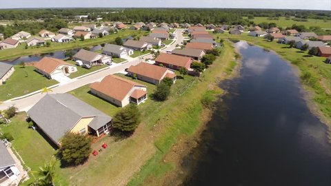 Aerial video of lakefront houses in Sarasota Florida USA