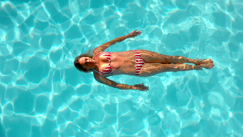 Woman Floating Swimming Pool Slow Motion Stock Footage Video Royalty Free