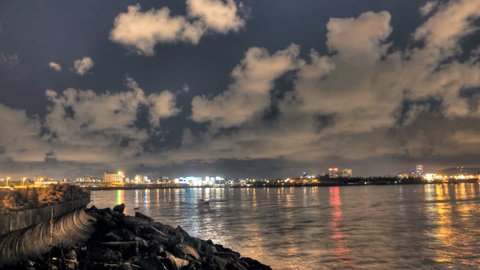 HDR time lapse of Mumbai coastline and cityscape at night. the shot PANS from left to right. each frame is a fusion of 3 exposures. 4k RAW available.