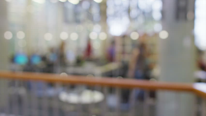 Diverse group of students in large modern university building