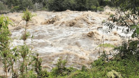 Rio Quijos in flood after a tropical storm. A tributary of the Amazon on the eastern slope of the Andes in Ecuador.