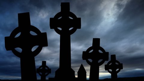 Celtic crosses and dark clouds time lapse