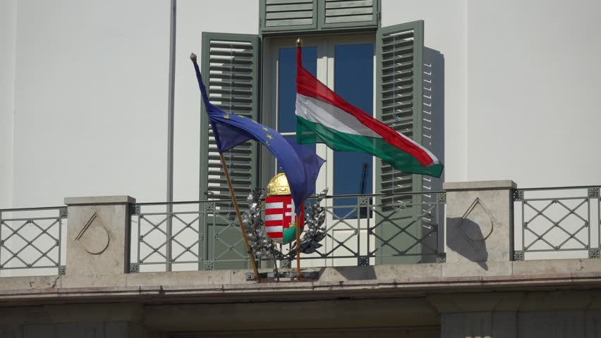 Hungarian and european flag flutters in the wind on the Sandor Palace (Office of the President of the Republic of Hungary), native 60fps RX10 video