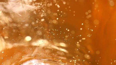 whiskey and ice in glass, bubble float, background