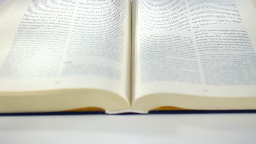 Bible Book scrolling by hand 2a