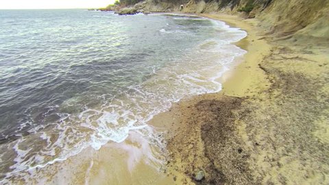 Aerial video shot in a typical Mediterranean beach.
Moving along the seashore over Stones, trees and sand with a DJI Phantom quad copter.
Calella de Palafrugell beach in Girona, Catalonia.
