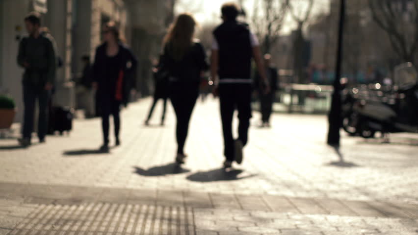 Silhouette of people walking in the city, super slow motion, shot at 240fps
 | Shutterstock HD Video #6583994