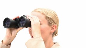 Blond business woman holding binoculars against a white background - Powered by Shutterstock - Get 15% off with code: PIKWIZARD15