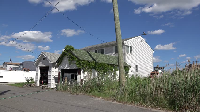 Low Flying Plane over House