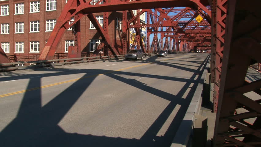 Time lapse of traffic driving over steel bridge in Portland, Oregon.