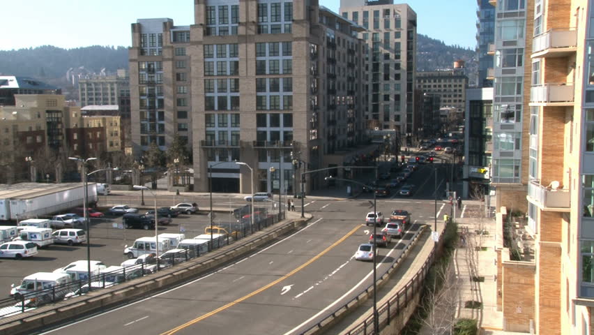 Time lapse of traffic entering downtown Portland, Oregon on sunny day.