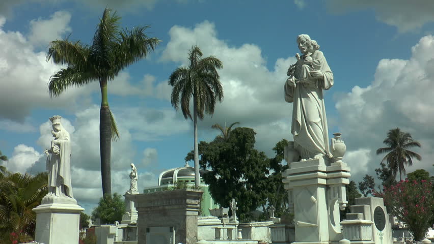 vintage marble statue of apostle with child at cemetery santa ifigenia in santiago de cuba