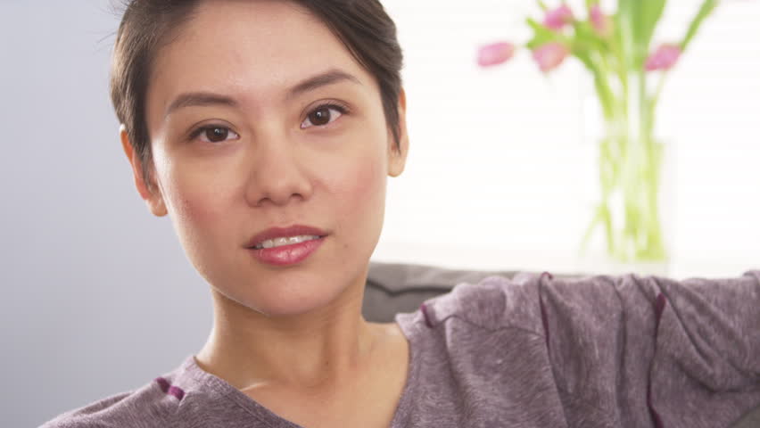 Attractive Mixed Race woman looking at camera | Shutterstock HD Video #6596684