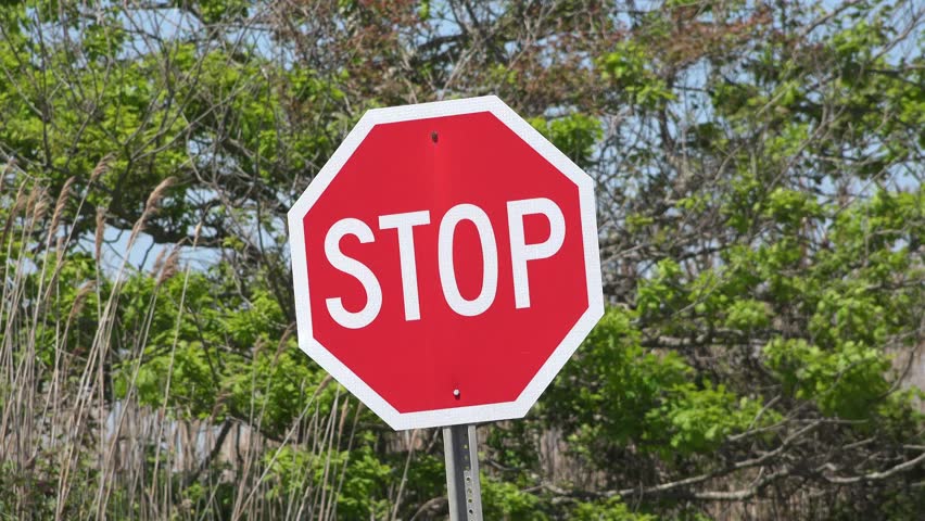 Wide Stop Sign by Busy Urban Road with Old Car -… - Royalty Free Video