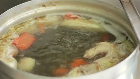 Close up hot Chicken stock on fire