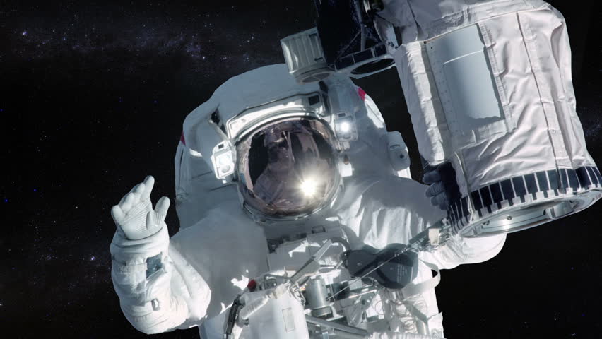 Astronaut in outer space over stars background. Elements of image furnished by NASA. MORE OPTIONS IN MY PORTFOLIO.