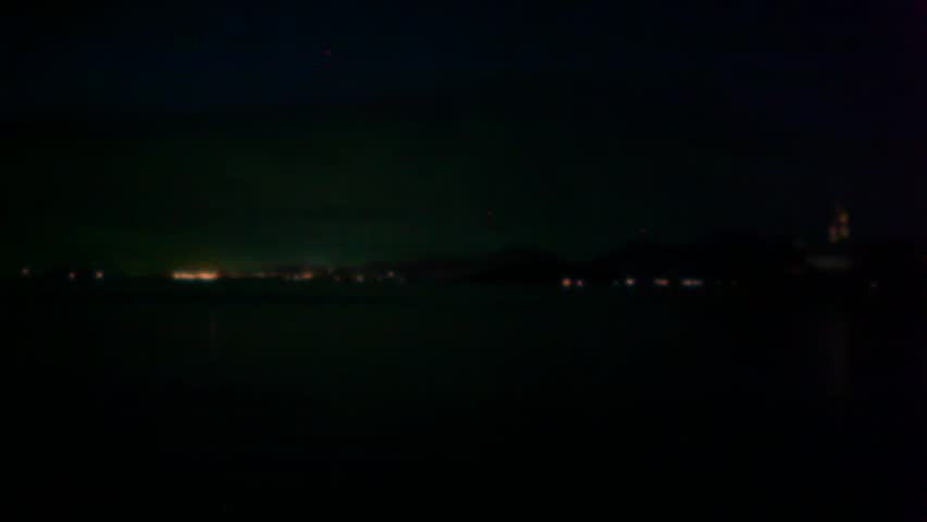 Lightning in the sea during night time. Time lapse video speed up blurred background
