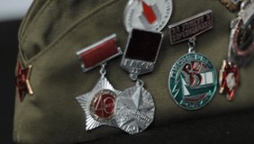 Soviet or communist military and civil decorations on a military cap. - Powered by Shutterstock - Get 15% off with code: PIKWIZARD15