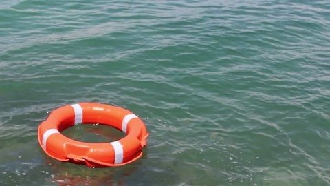 Red Safe Buoy Being Thrown Into Stock Footage Video (100% Royalty-free 