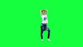 Dancing girl against a green background
