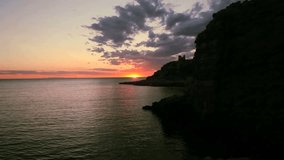 Sunset By The Sea In Apulia South Italy With Birds Flying 