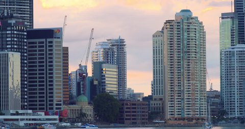 Brisbane City seen over the river from kangaroo point at sunset