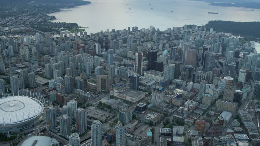 Aerial sunset harbour view Winter Olympic Stadium - Vancouver - July 2013: Aerial sunset harbour view Winter Olympic Stadium downtown Vancouver skyscrapers West Point View, English Bay, BC, Canada