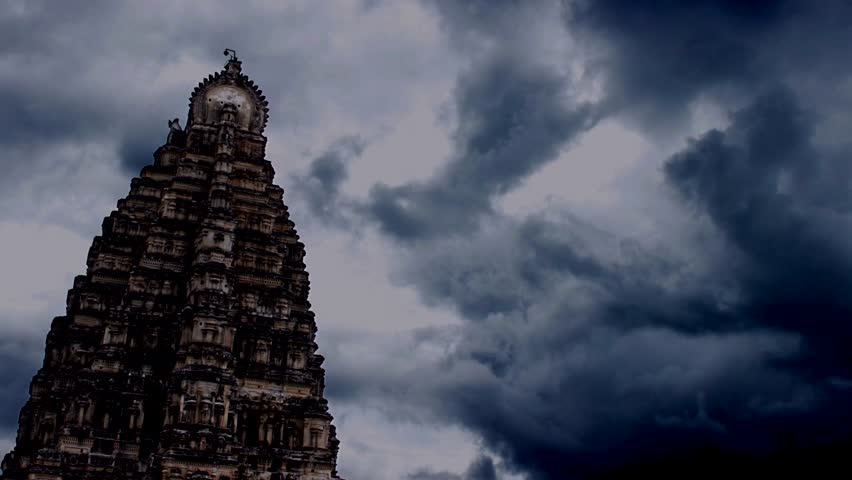 Timelapse of Hindu temple. Clouds rush past. Main temple, Hampi, India