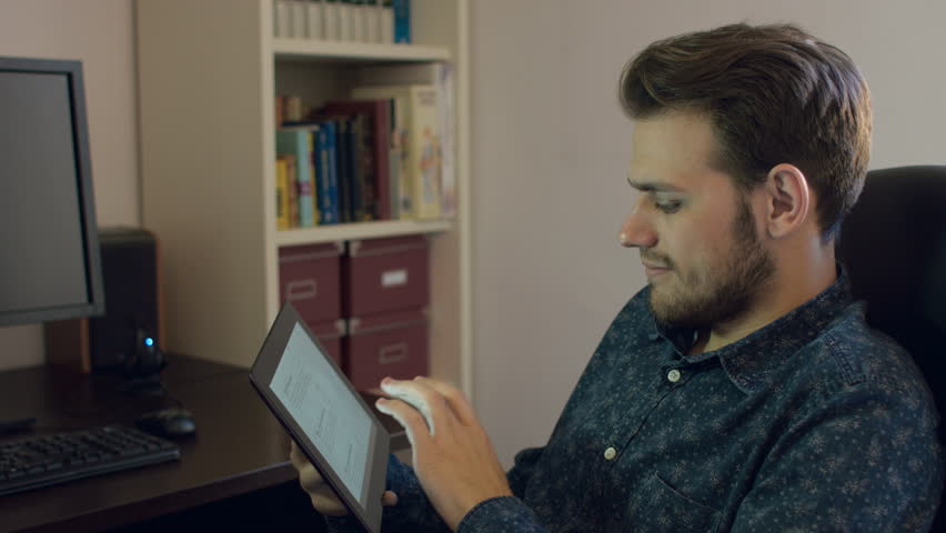 Happy young man with Tablet Computer on Social network dependence, 4k