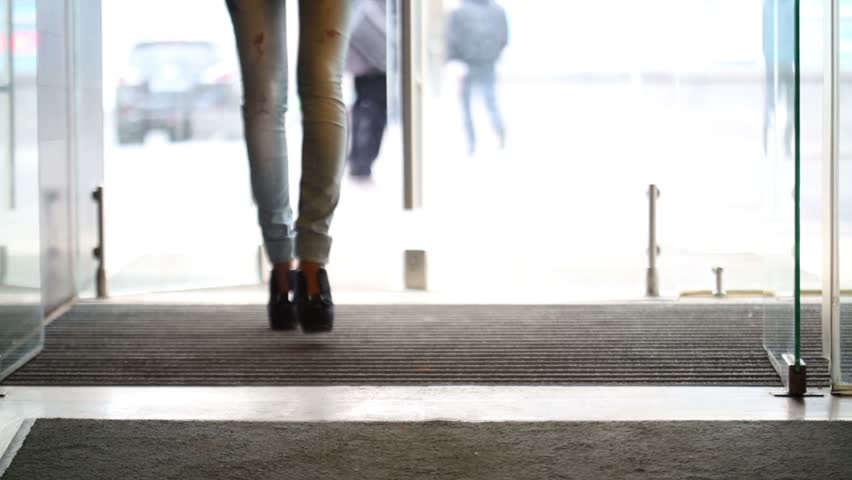 Ladylike candid with nice legs walking in the street