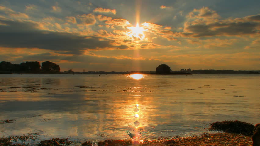 Sunset over the sea, HD time lapse clip, high dynamic range imaging