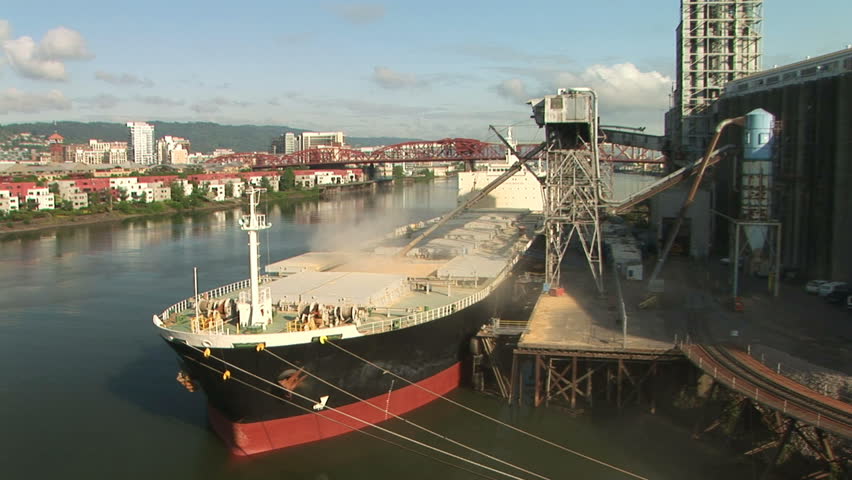Cargo ship being loaded up.  Docked on the Willamette river in Portland, Oregon.