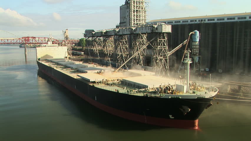 Cargo ship being loaded up.  Docked on the Willamette river in Portland, Oregon.