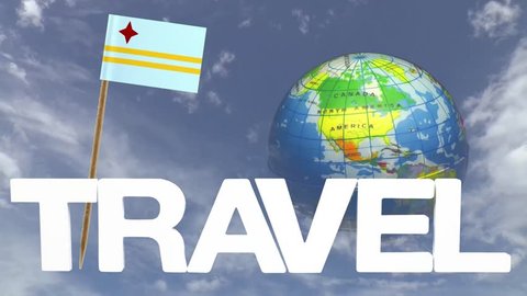 The word travel and a turning globe  in front of a blue sky with tooth pick and a small paper flag of ARUBA