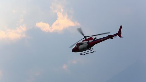 LUKLA, NEPAL - APRIL 2: Tenzing-Hillary Helicopter in the sky on April 2, 2014 in Lukla, Nepal. Full HD
