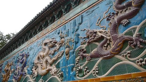 china royal nine dragon wall,stone dragon totem in forbidden city. 