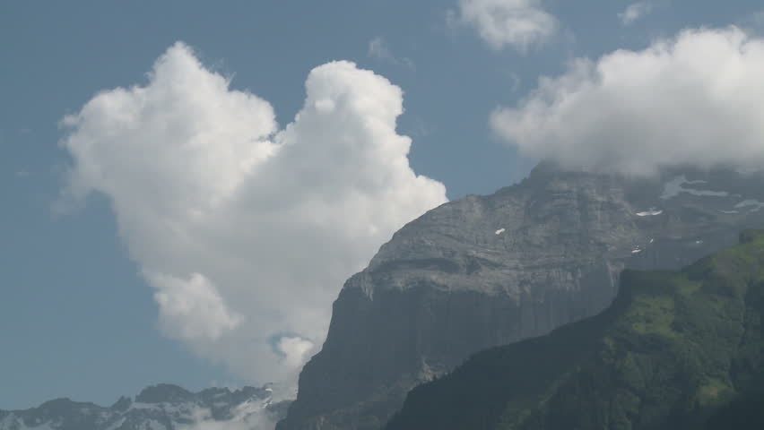 Clouds , Sky above Rock Mountains, Switzerland