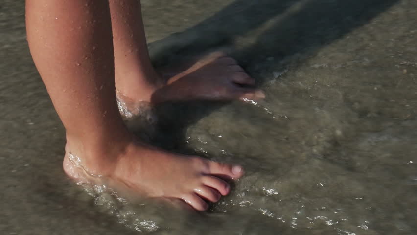 Ocean Waves Crashing on Feet